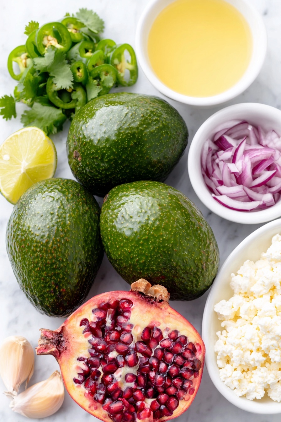 Flat lay of four medium ripe avocados, diced and pitted, a small white ceramic bowl filled with fresh lime juice, two whole uncracked garlic cloves, a small white bowl containing sea salt, half a medium red onion roughly chopped, a small bunch of fresh cilantro leaves chopped, one to two small jalapeños chopped, a medium pomegranate split open showing abundant juicy red arils, and a small white bowl holding crumbled feta cheese, all arranged symmetrically on a simple white ceramic surface, placed on a clean white marble surface, soft natural light, photo taken with an iPhone, professional food photography style, fresh ingredients, white ceramic bowls, no bottles, no duplicates, no utensils, no packaging --ar 2:3 --v 7 --p m7354615311229779997